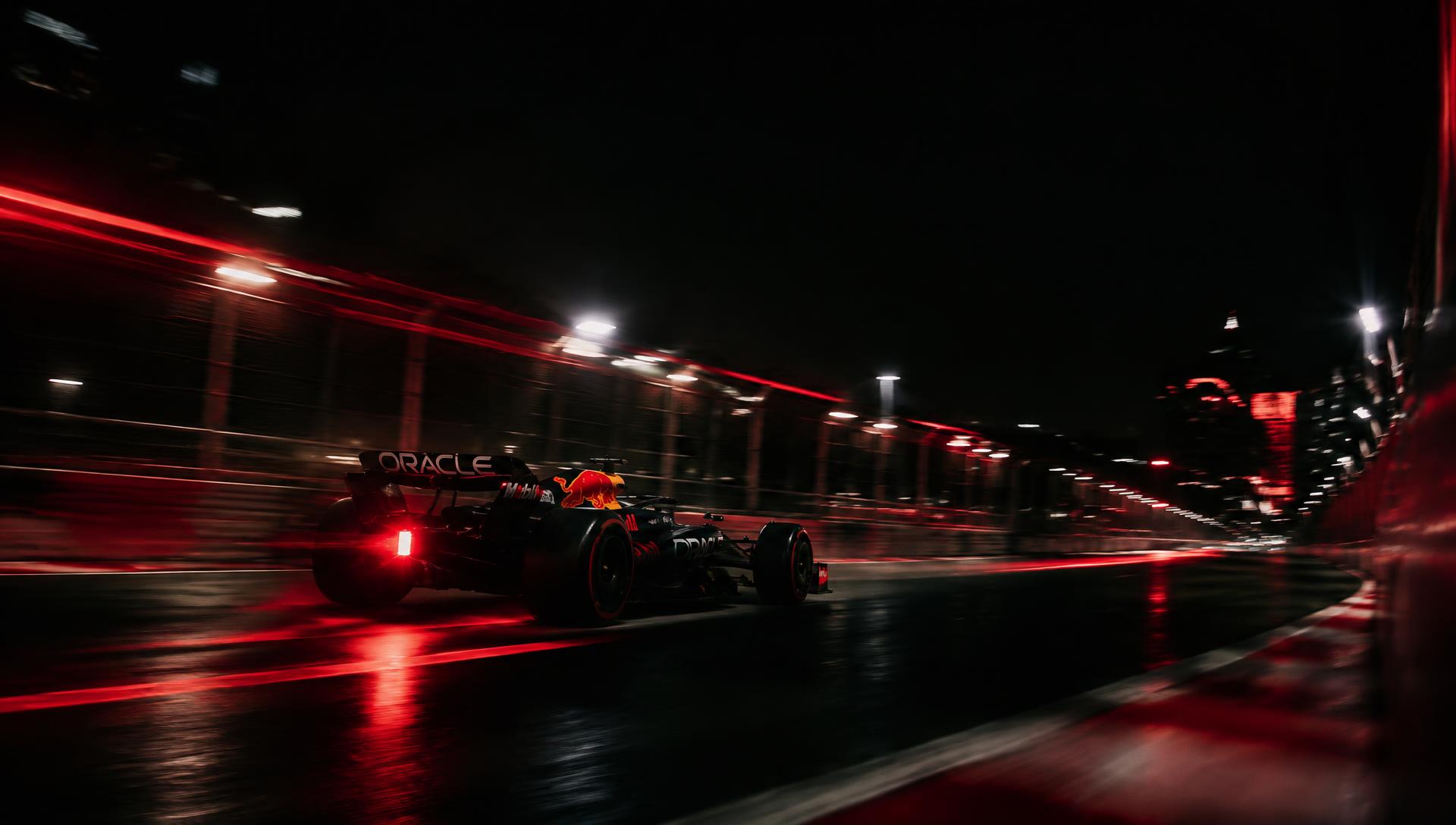 Formula 1 car racing at night